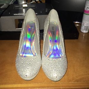Size 9 1/2 silver slippers
